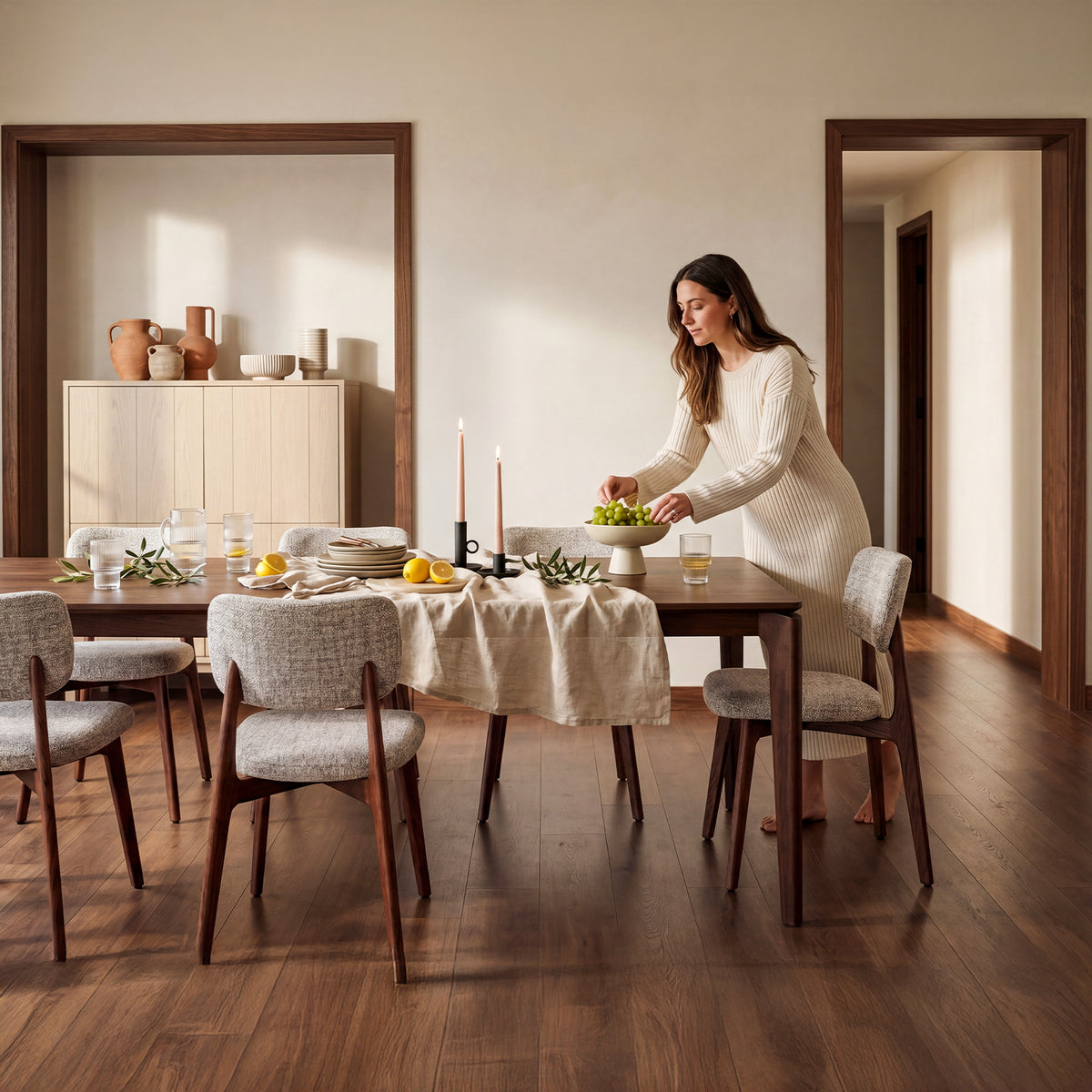 COLAMY NOYA Prime upholstered dining chairs with walnut red oak frames in a sunlit modern dining room