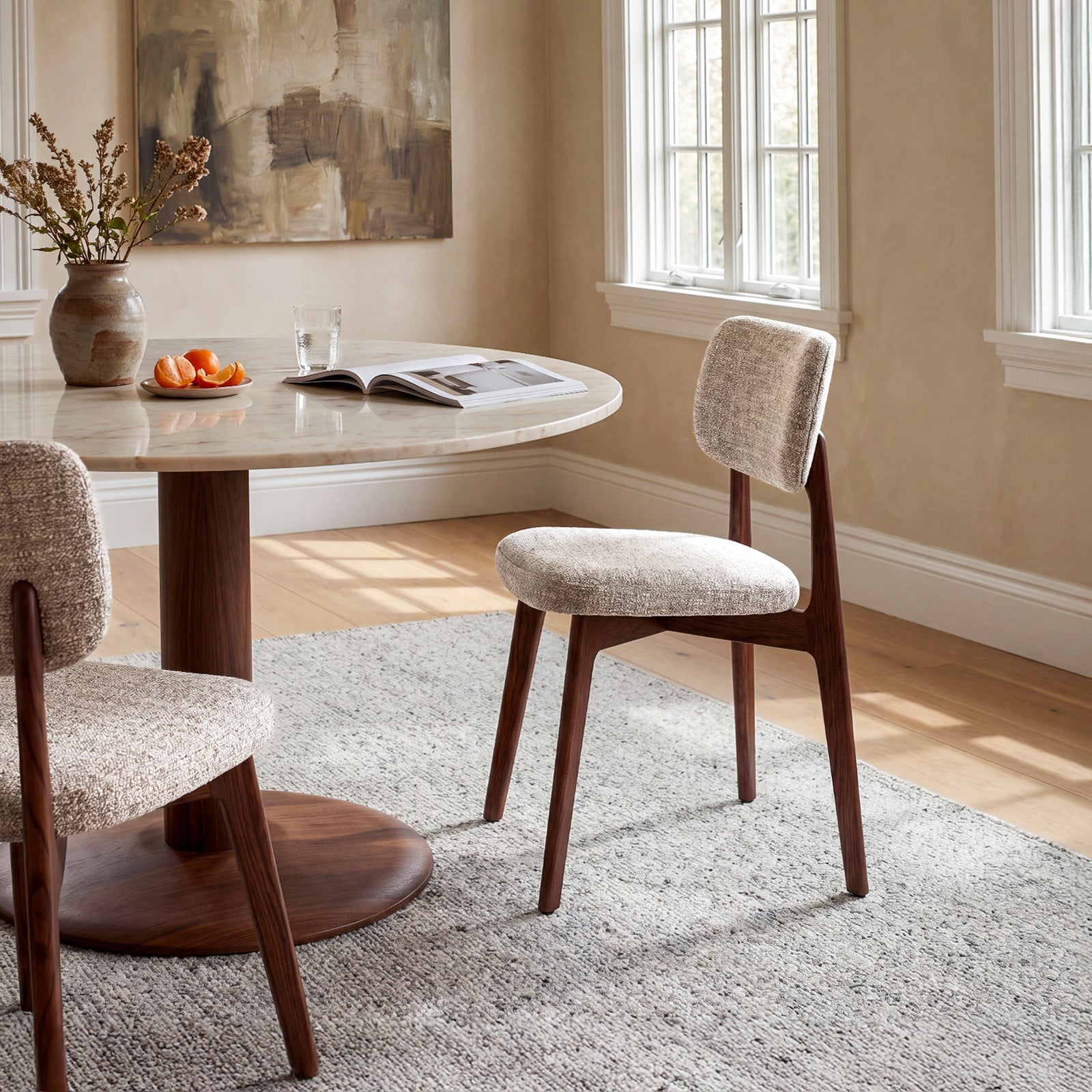 COLAMY NOYA Prime oatmeal upholstered dining chairs with walnut red oak frame in a bright dining room