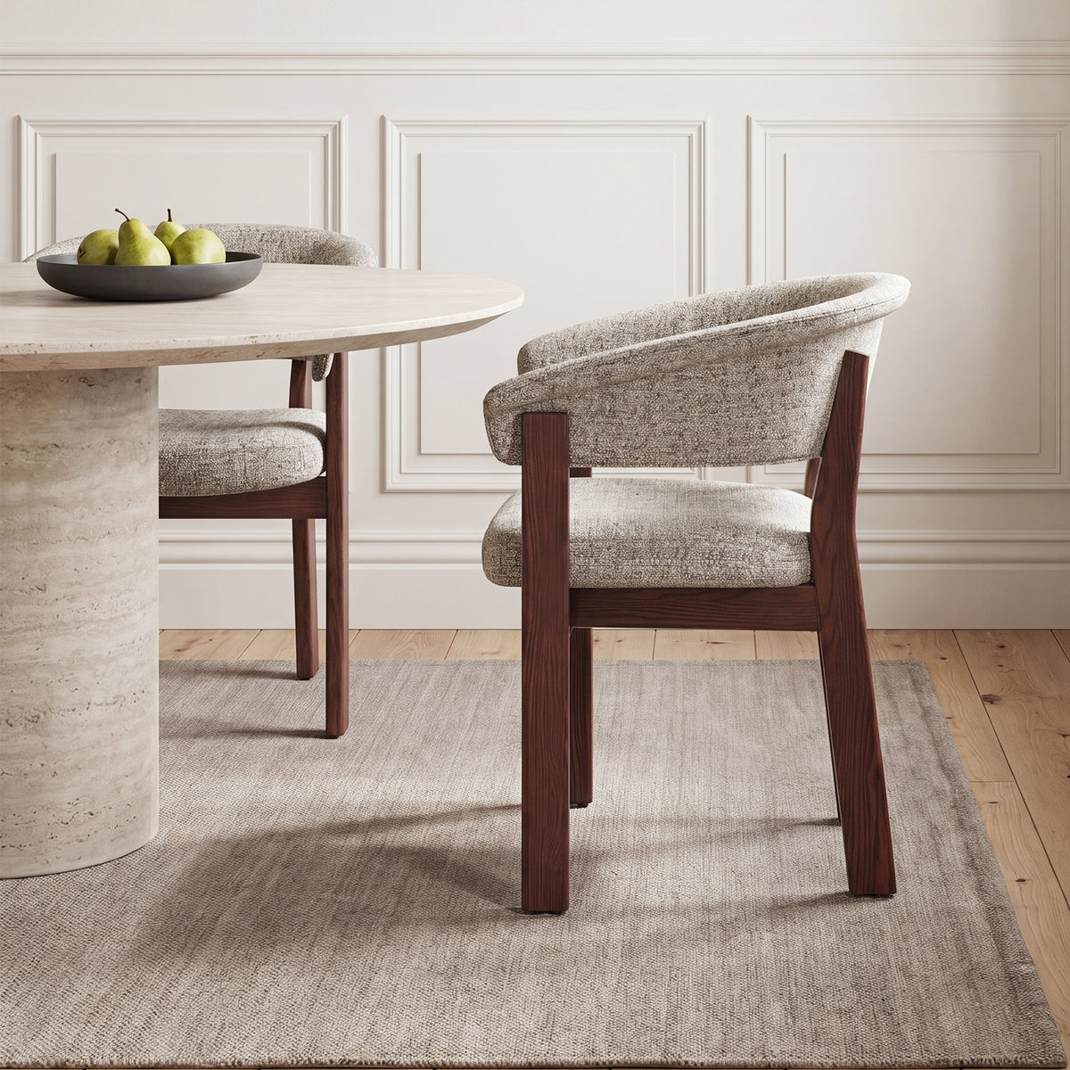 Side view of a beige and walnut HALO Luxe chair at a round dining table