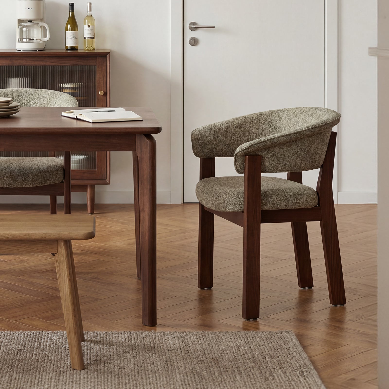 Oatmeal and walnut HALO Luxe dining chair beside a wood dining table