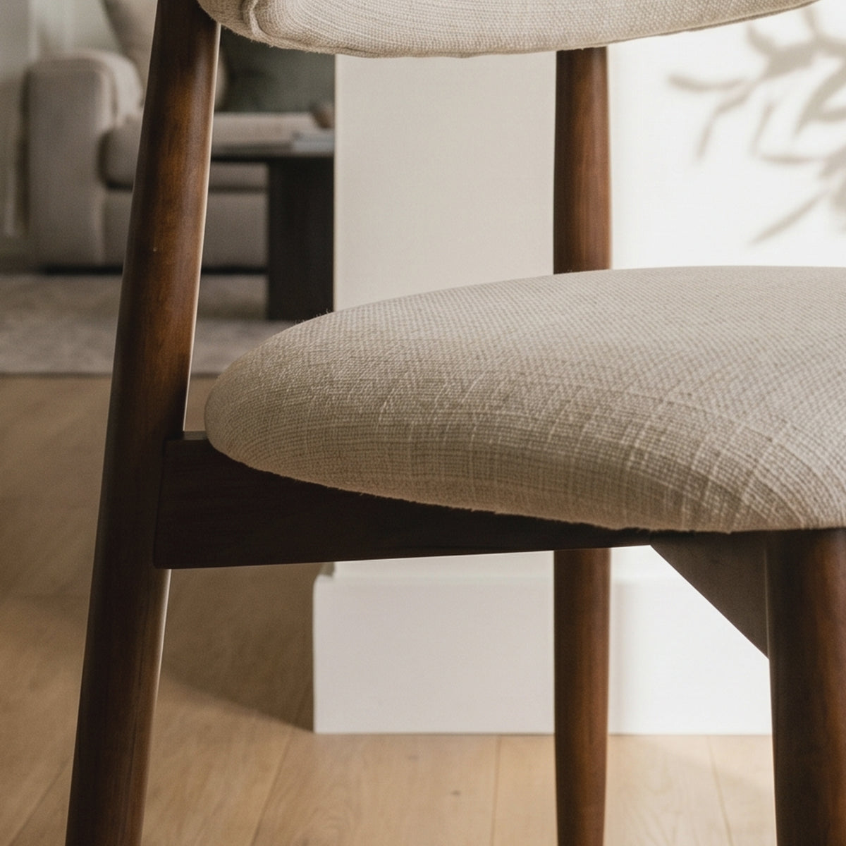NOYA upholstered dining chair soft fabric seat and ergonomic comfort design